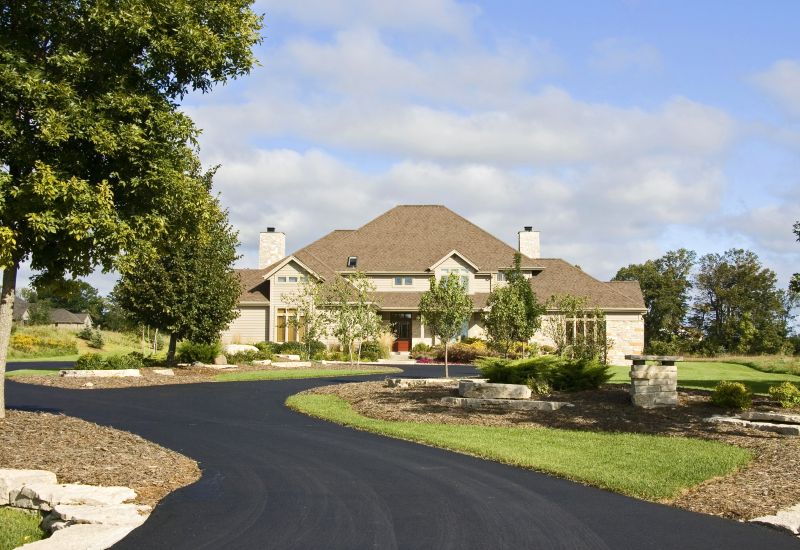 Prevent Cracks and Damage With Professional Asphalt Driveway Sealing Service!